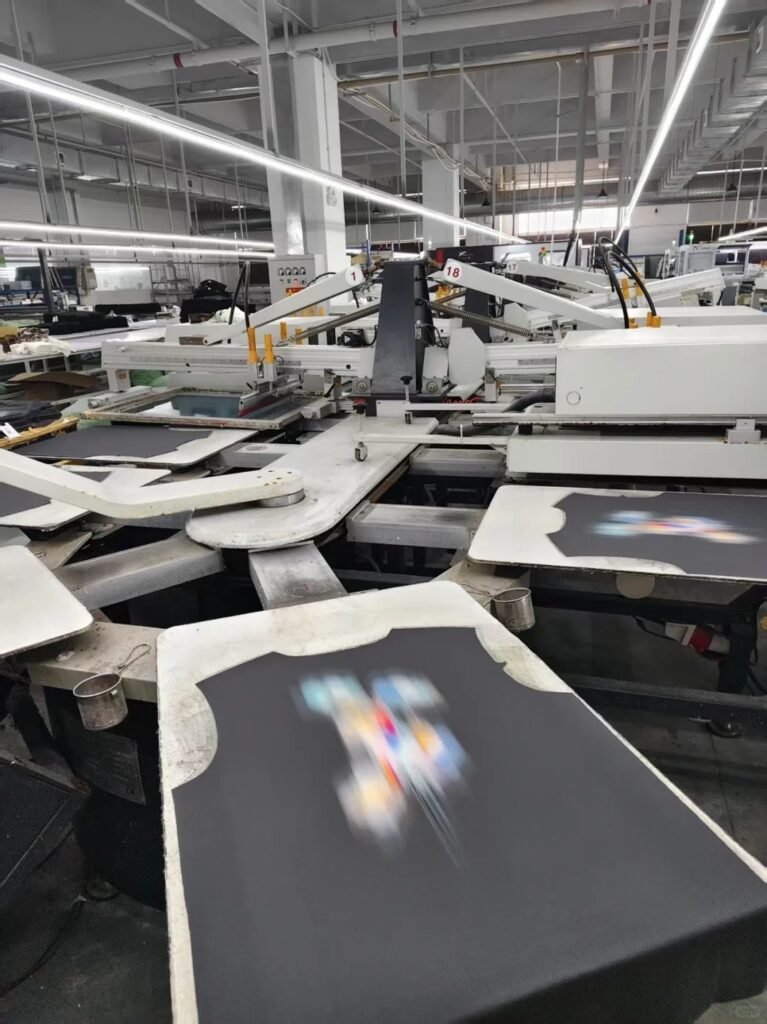 Large machines are working on garment printing prints
