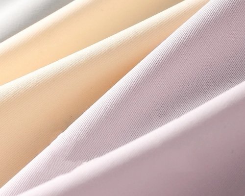 One of the three major elastic yarns used in the manufacture of sportswear—Creora